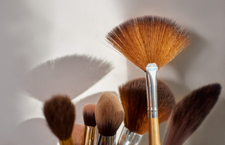 Professional brushes in a vase and makeup toolsの写真素材