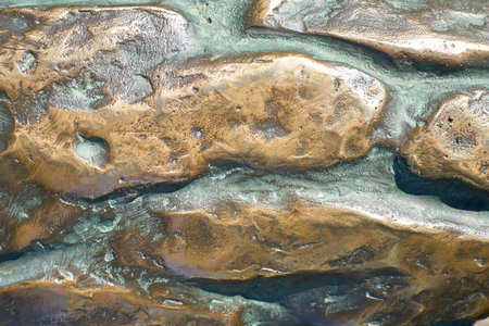 Bronze texture for backgrounds. Grunge metal background close-up. selective focus
