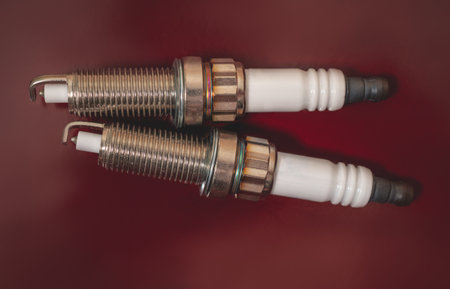 Spark plugs for a car on a dark backgroundの写真素材