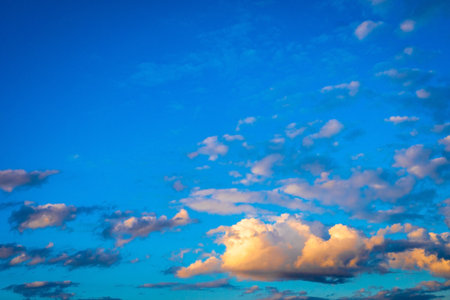 Beautiful cumulus clouds against a blue sky.の写真素材