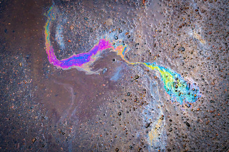 Oil Petrol Pollution Rainbow Gasoline Leak on Pavement.の写真素材