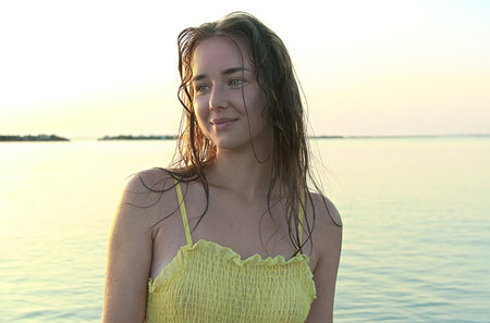 Portrait of a young beautiful girl at sea. Tropical vacation.の写真素材