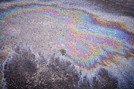 Fuel or Oil Texture on Wet Asphalt.の写真素材
