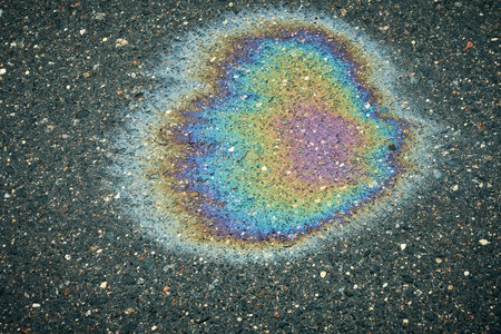 Colorful painted heart on asphalt road. Selective focus. Toned.の写真素材