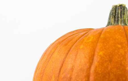 Ripe orange pumpkin on a white background. Halloween pumpkin on a white background.Fresh organic pumpkin on a white background.の写真素材
