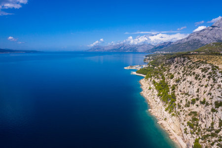 Aerial drone view. Beautiful coastline, clear sea from a bird's eye view of Dalmatia, Croatia. Makarska Riviera, famous and tourist place in Europeの写真素材