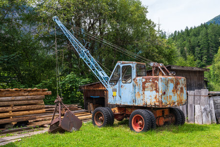 Old rusty tractor in a beautiful landscape. Heiligenblut. Hohe Tauern. Grossglockner National Park. Austriaの写真素材
