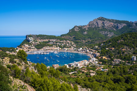Beautiful view of the coast in Port de Soller, harbor for yachts and ships on the island of Mallorca, Spain, Mediterranean Seaの写真素材