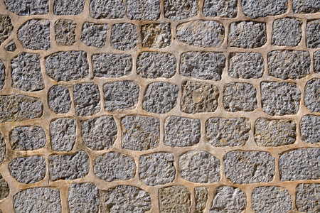 Flat lay photograph of a colorful stone wall. Stone background textureの写真素材