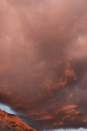 Huge red-orange clouds at sunset.