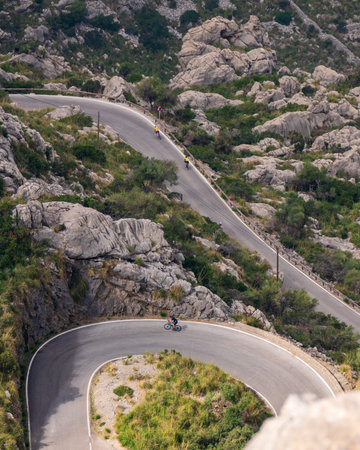 The famous Sa Calobra road in Mallorca, Spain, a favorite place for all cyclists. Lonely bikers,...