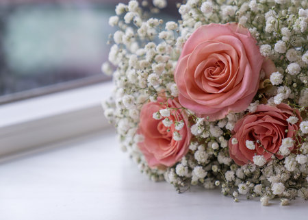 Wedding details. The bride's bouquet. Pink roses with white flowersの写真素材