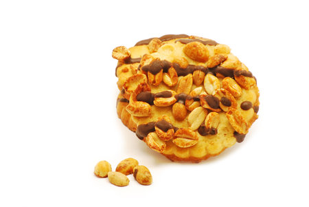 Biscuits with chocolate and nuts isolated on white background