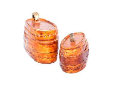 Small wood barrels isolated on white