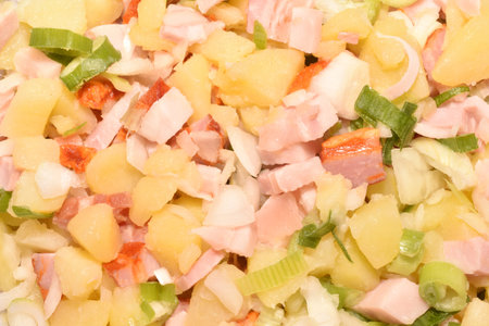 Fresh salad with ham and boiled potatoesの写真素材