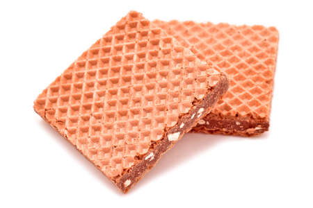 Wafers with chocolate and nuts isolated on whiteの写真素材