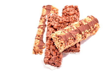 Cereal bars with chocolate isolated on white backgroundの写真素材