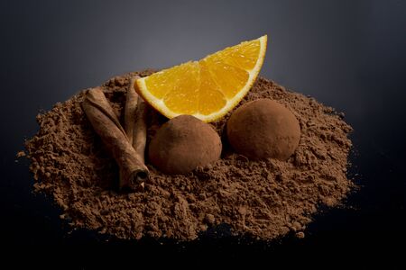 Orange segment with cocoa and cinnamonの写真素材