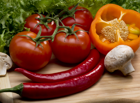 Vegetables on a chopping boardの写真素材