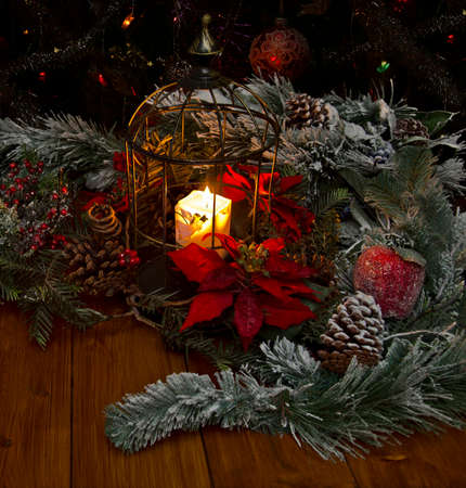 In festive night. Pine branches and the burning candle.の写真素材