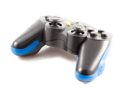 Black and blue joystick to control games with lots of buttons on a white background
