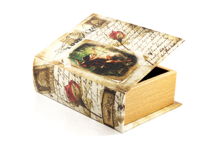Secret old book shaped casket isolated over white backgroundの写真素材