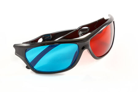 3D glasses with blue and red glass in a black plastic frame isolated on white backgroundの写真素材