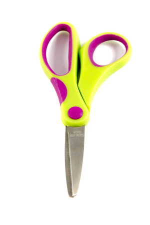 Children s scissors with plastic handles green color isolated on white backgroundの写真素材