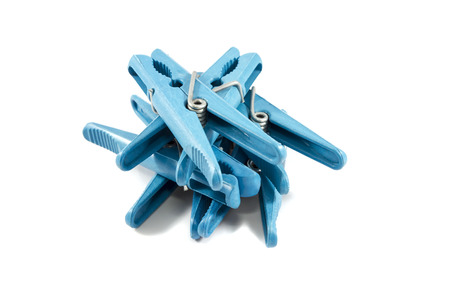Blue clothes peg isolated on a white background の写真素材