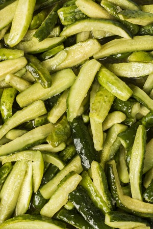 Sliced ââcucumbers marinated with spices and cooked for conservationの写真素材
