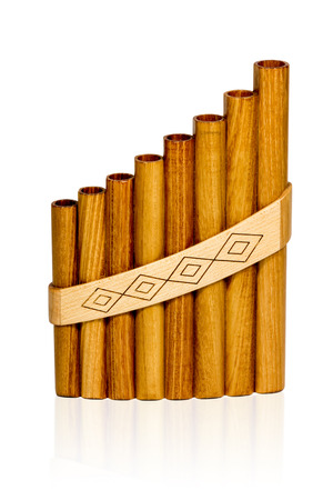 Peruvian Pan Flute wooden light brown color isolated on a white backgroundの写真素材
