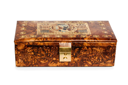 Leather gift box with Egyptian ornaments and metal clasp isolated on a white backgroundの写真素材