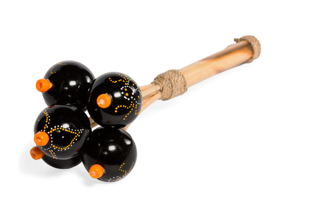 Beautiful black composite maracas isolated on white backgroundの写真素材