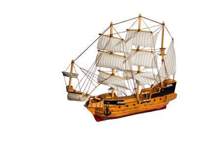 Model of the old sailing merchant ships with cannons and masts isolated on white background