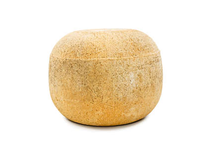 Large round yellow cheese is not cut isolated on white backgroundの写真素材