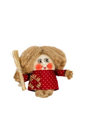 Hand made rope doll hobgoblin with a broom in his hand isolated on a white backgroundの写真素材