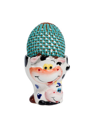 Easter egg beaded handmade on stand isolated on white backgroundの写真素材