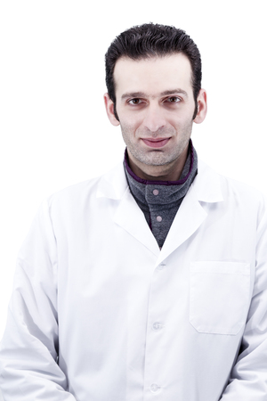Portrait of a man with stubble on his face in white medical gown isolated on white backgroundの写真素材