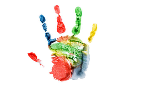 Bright child palm print using colorful paints isolated on white backgroundの写真素材