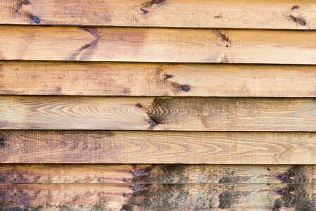 Background of the old dirty boards in retro style overlapping one another