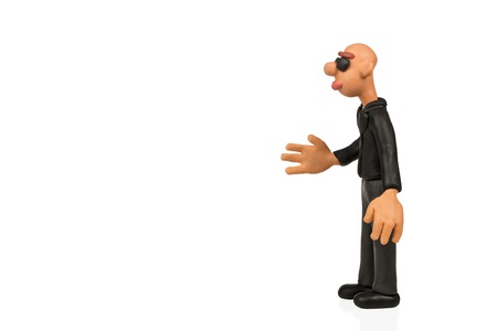 Bald plasticine man stretched out his hand for a handshake isolated on white backgroundの写真素材