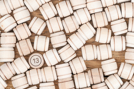 Number thirteen stands out among the lying kegs of lottoの写真素材