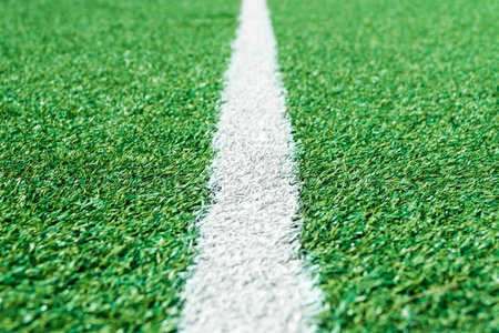Line that extends from the center into the distance on an artificial football field
