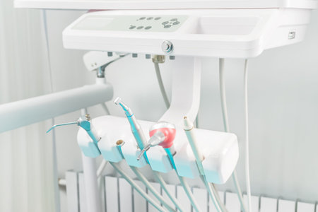 part of the dental chair with a drill, air and other devices