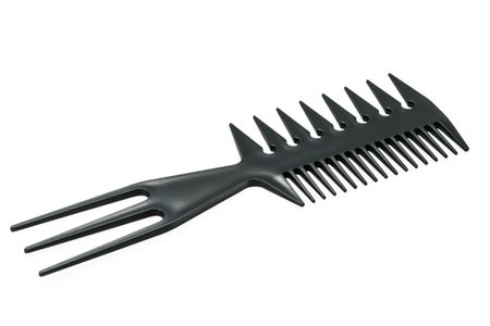 triple flat comb for hairdressers isolated on white background