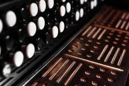 digital button accordion Close-up a black backgroundの写真素材