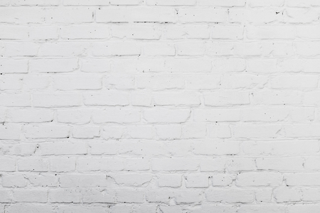 White background of old brick wall texture with delicate vignetting.の写真素材