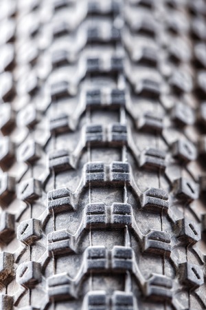 Bicycle wheel and tire close up on tread abstract. Macro.の写真素材