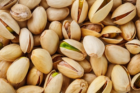 Pistachio texture. Nuts. Green fresh pistachios as texture.の写真素材