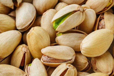 Pistachio texture. Nuts. Green fresh pistachios as texture.の写真素材